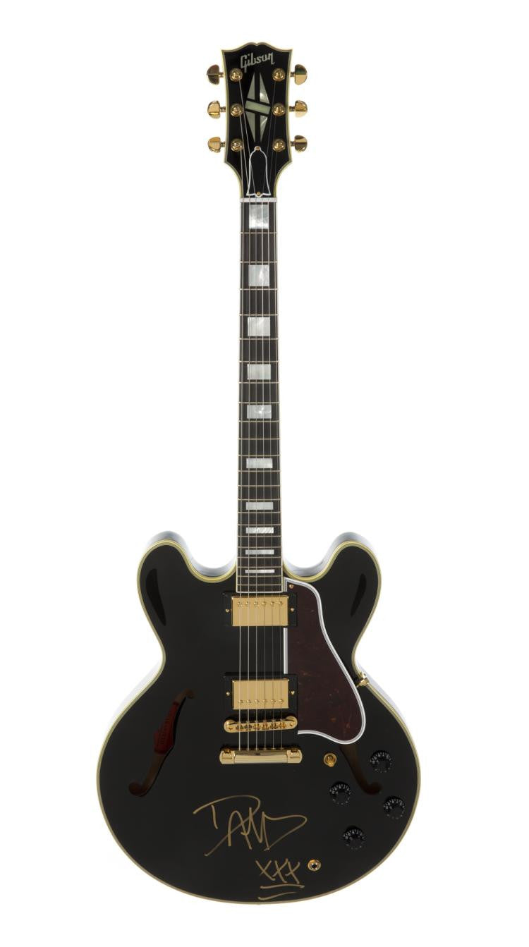 Lot 525: DAVE GROHL SIGNED GUITAR