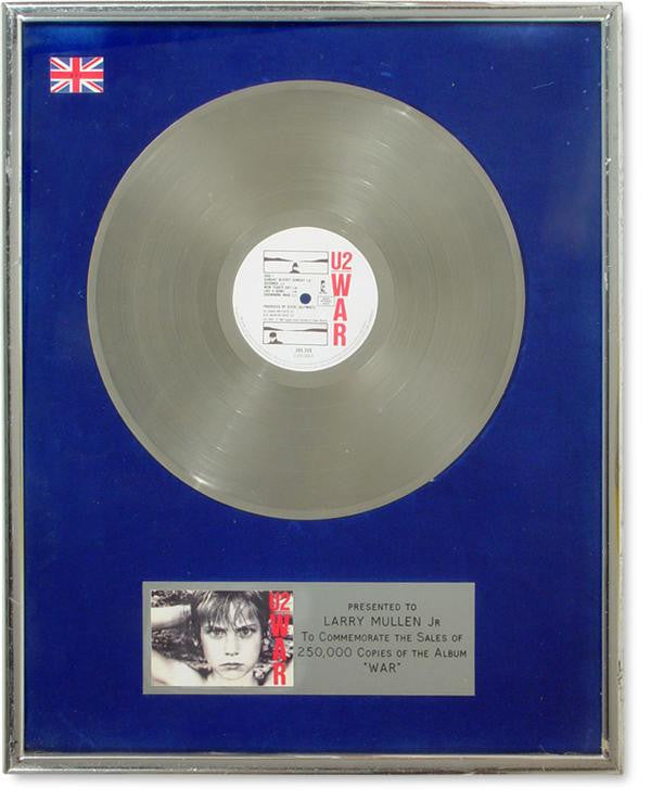 Lot 67: Larry Mullen's U2 "War" British Gold Record Record Award