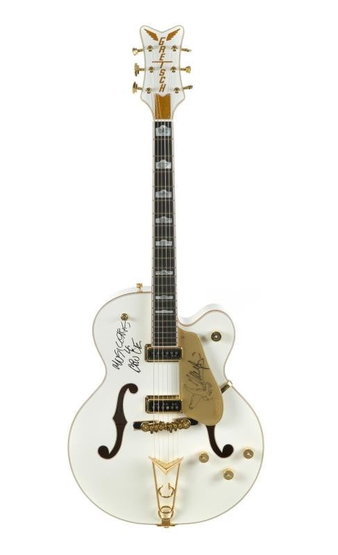 NEIL YOUNG TUNED, STRUMMED AND SIGNED GUITAR