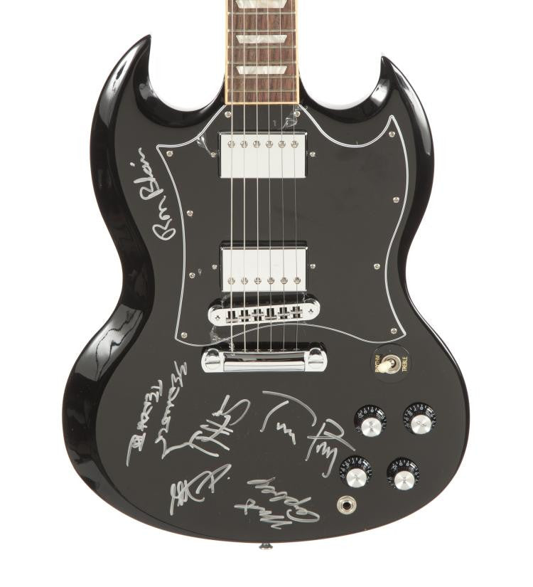 Lot 512: TOM PETTY AND THE HEARTBREAKERS SIGNED GUITAR