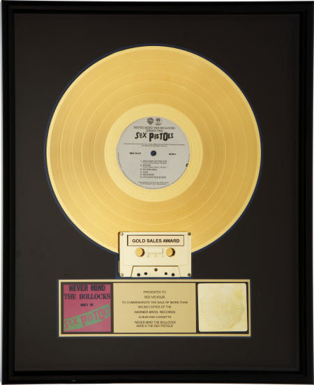 The Sex Pistols - Gold Record Award for "Never Mind the Bollocks" Presented to Sid Vicious