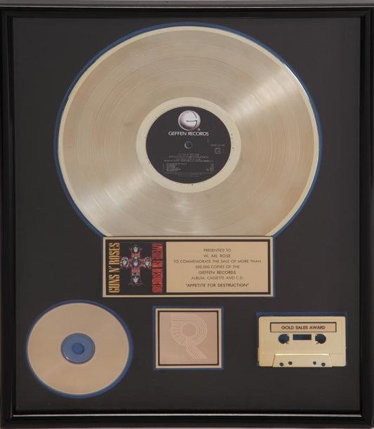 GUNS N' ROSES "GOLD" RECORD AWARD PRESENTED TO W. AXL ROSE