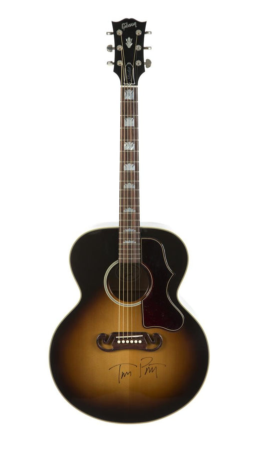 Lot 511: TOM PETTY SIGNED GUITAR AND DVD