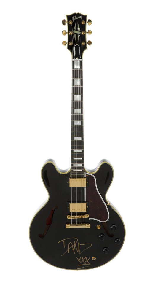 Lot 525: DAVE GROHL SIGNED GUITAR