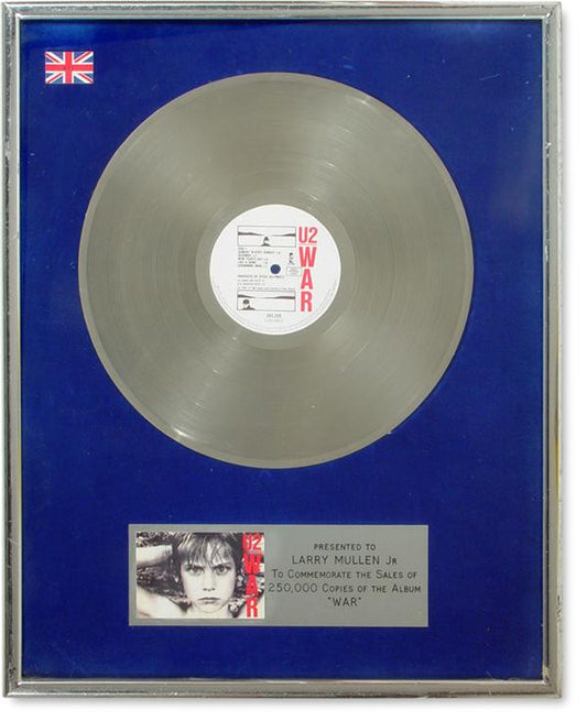 Lot 67: Larry Mullen's U2 "War" British Gold Record Record Award
