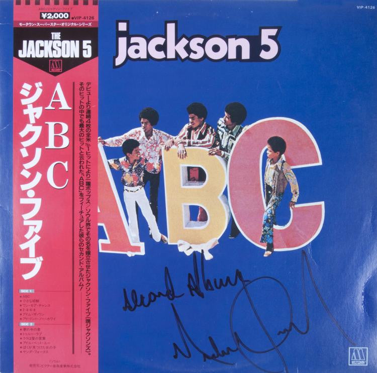 Lot 9: MICHAEL JACKSON SIGNED AND INSCRIBED ALBUM