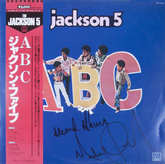 Lot 9: MICHAEL JACKSON SIGNED AND INSCRIBED ALBUM