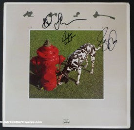 Rush Signals Autographed Album