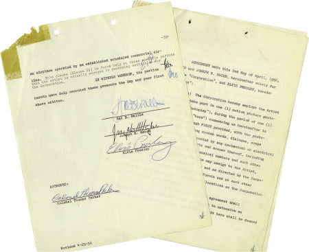 Elvis and Colonel Tom Parker Signed Movie Contract.